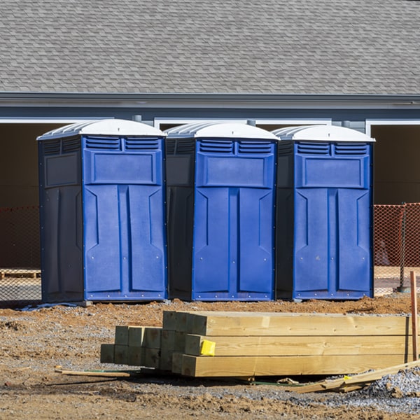 what is the cost difference between standard and deluxe portable restroom rentals in Rose Hill KS